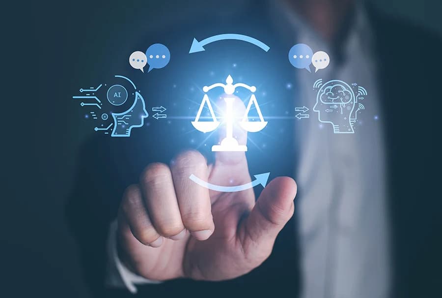 A hand points to a holographic image of scales of justice with the outlines of two heads on either side, one with the letters AI within it
