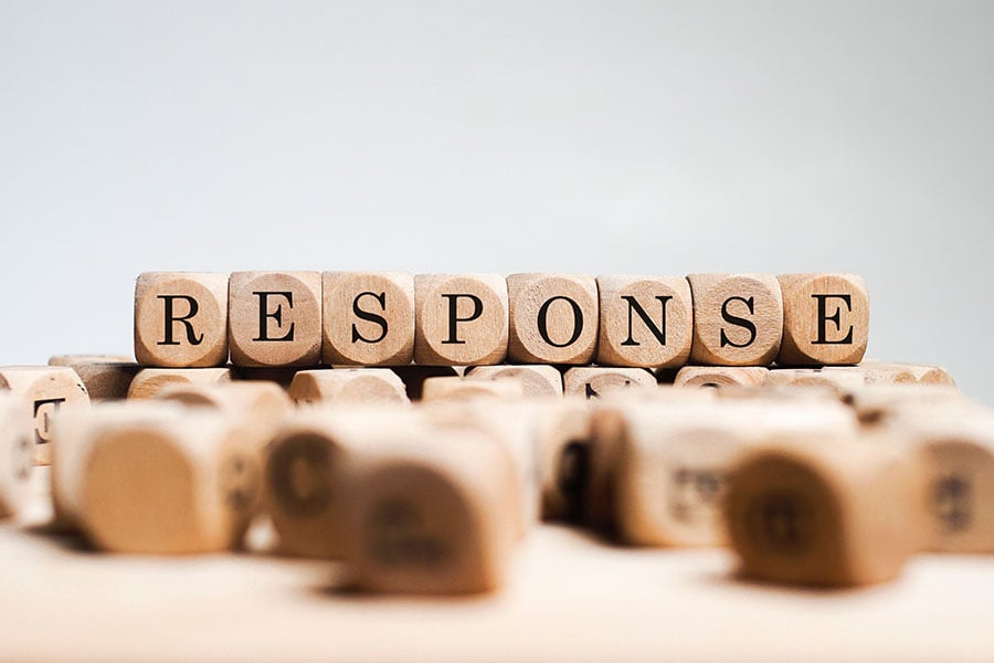 The word 'response' spelled out on wooden cubes