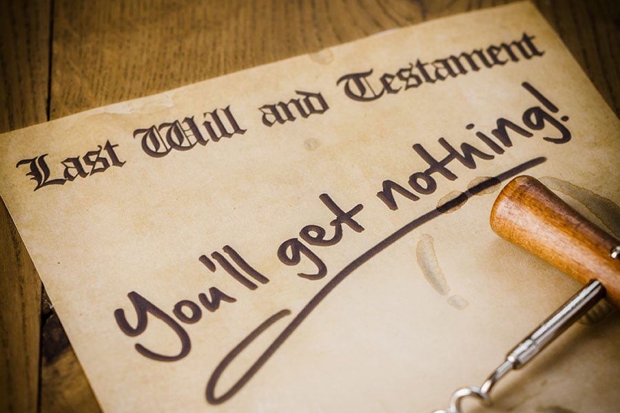 A paper will with the words 'you'll get nothing' written on it