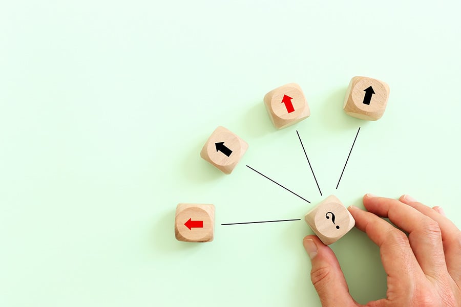 Arrows on small wooden cubes