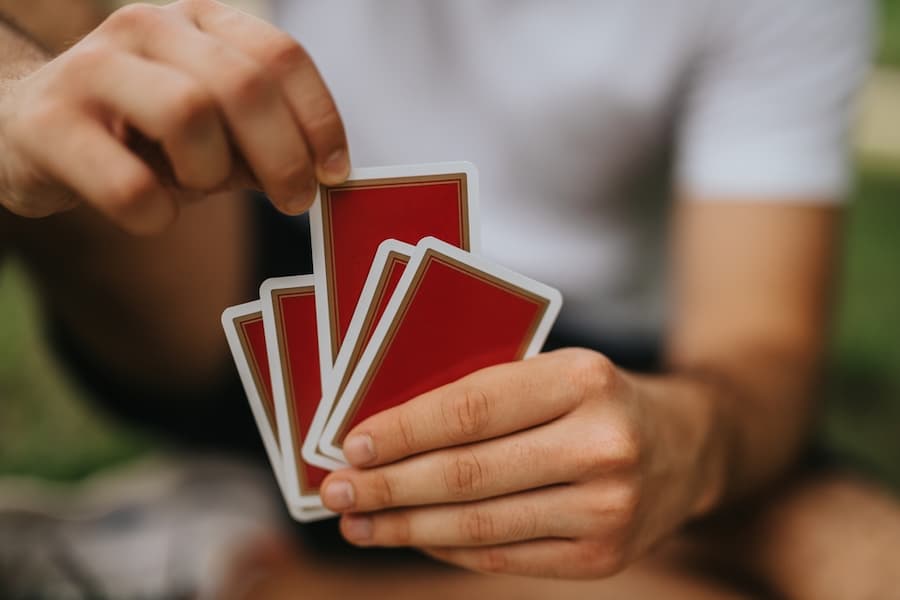 Hand holding playing cards