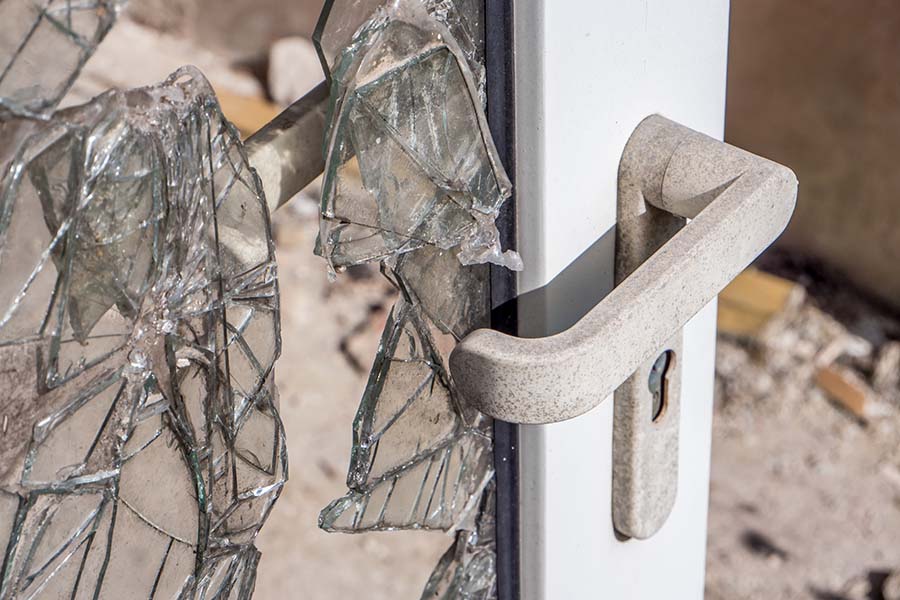 smashed glass on a front door
